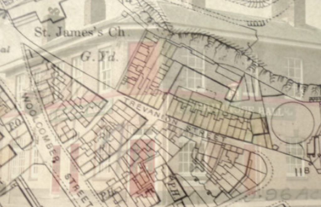 An image of an old map of Trevanion and Woolcomber Streets in Dover, overlaid on a photo of an old building
